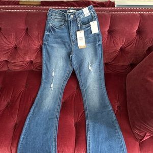 New with Tags- 73% Cotton YMI Vintage Dream Jeans. 
Size 7/28.